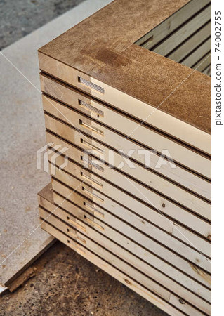 Joinery. Wood door manufacturing process. Stacked door leafs. Furniture manufacture 74002755