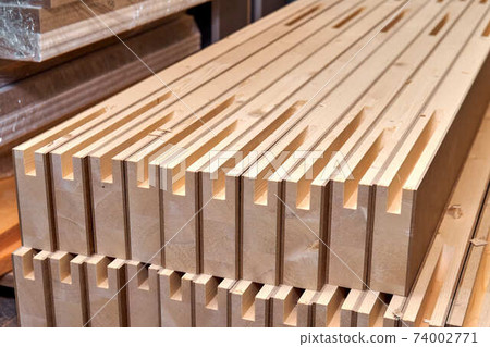 Joinery. Wood door manufacturing process. Stacked door leaf elements. Furniture manufacture 74002771