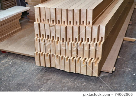 Joinery. Wood door manufacturing process. Stacked door leaf elements. Furniture manufacture 74002806