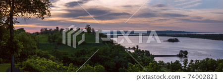 Dnipro river summer evening view from Taras Hill or Chernecha Hora (Monk Hill - important landmark of the Taras Shevchenko National Preserve, Kaniv, Cherkasy Region, Ukraine. 74002821