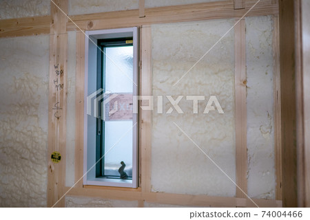Construction site of a newly built single-family house with spray insulation Construction site of a newly built single-family house with spray insulation 74004466