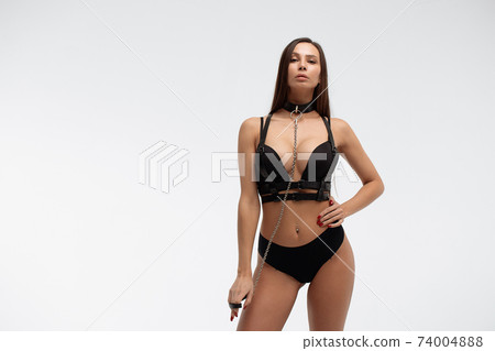 Sexy woman in collar and black lingerie Sexy woman in collar and black lingerie 74004888