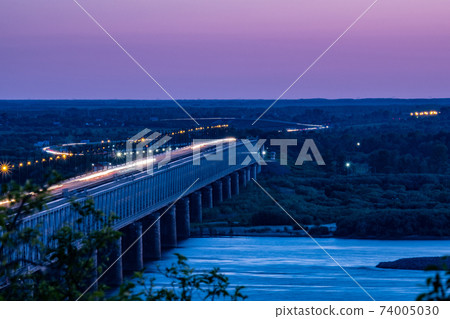 Bridge over the Amur river in Khabarovsk, Russia. Night photography. Bridge over the Amur river in Khabarovsk, Russia. Night photography. 74005030