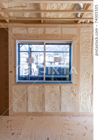 Construction site of a newly built single-family house with spray insulation 74005505