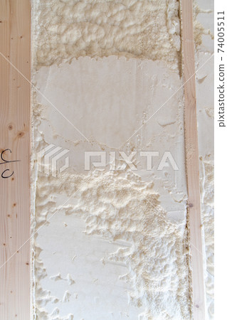 Construction site of a newly built single-family house with spray insulation 74005511
