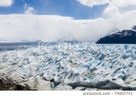 Walking on Perito Moreno glacier Patagonia, Argentina 74005741