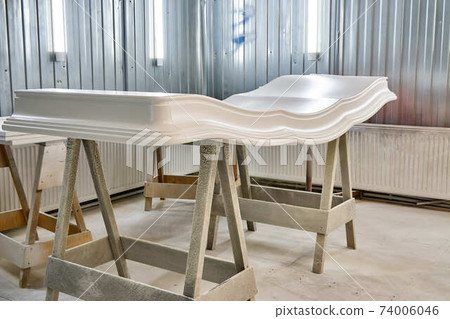 Classic wardrobe crown molding. Production of wood furniture. Furniture manufacture Classic wardrobe crown molding. Production of wood furniture. Furniture manufacture 74006046