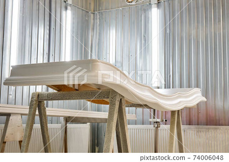 Classic wardrobe crown molding. Production of wood furniture. Furniture manufacture 74006048