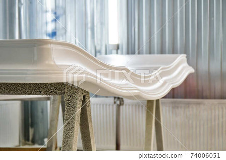 Classic wardrobe crown molding. Production of wood furniture. Furniture manufacture 74006051