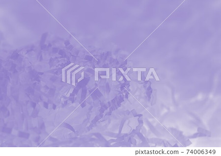 Light violet background of shredded paper. Strips of sliced corrugated paper for packing Light violet background of shredded paper. Strips of sliced corrugated paper for packing 74006349