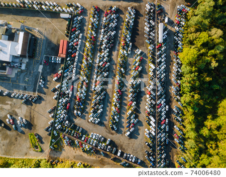 Many used car auction lot parked distributed in a parking. Many used car auction lot parked distributed in a parking. 74006480