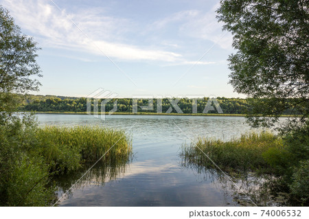 Dnister river and distant hills in Bakota area, part of the National park "Podilski Tovtry" in Ukraine Dnister river and distant hills in Bakota area, part of the National park "Podilski Tovtry" in Ukraine 74006532