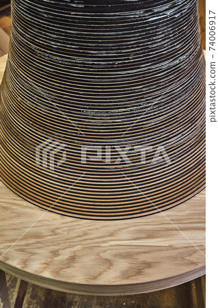 Joinery. Creative round shape coffee table made of mdf and natural wood 74006917