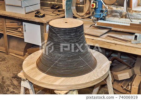 Joinery. Creative round shape coffee table made of mdf and natural wood Joinery. Creative round shape coffee table made of mdf and natural wood 74006919