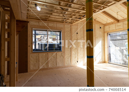 Construction site of a newly built single-family house with spray insulation 74008514