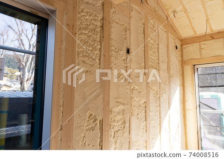 Construction site of a newly built single-family house with spray insulation 74008516