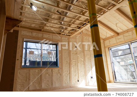 Construction site of a newly built single-family house with spray insulation 74008727