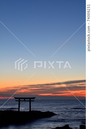 Sunset and rocky torii Sunset and rocky torii 74009231