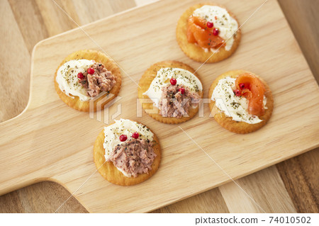 Pate and smoked salmon canapes 74010502