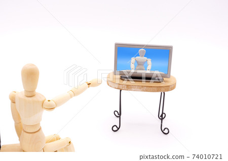 A drawing doll that points out to the TV screen A drawing doll that points out to the TV screen 74010721