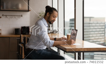 Black male expert study stock prices rate growth graphs online 74011532