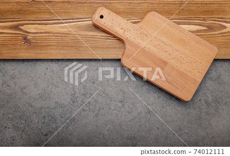 The Cutting board on shabby wooden background with copy space . 74012111