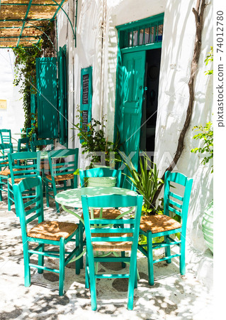 Traditional Greece series - cute small street taverna. Amorgos island Traditional Greece series - cute small street taverna. Amorgos island 74012780