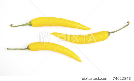 yellow hot chili on a plate. Pepper. Vegetable vitamin food. yellow hot chili on a plate. Pepper. Vegetable vitamin food. 74012848