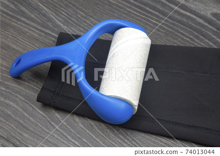 sticky plastic roller for cleaning clothes from dust, lint and hair sticky plastic roller for cleaning clothes from dust, lint and hair 74013044