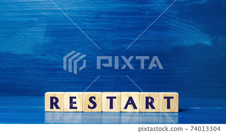Wooden blocks with the word Restart. New beginning and launch. Start of a new process. Back to the roots. Business concept. Start again. Renewal Wooden blocks with the word Restart. New beginning and launch. Start of a new process. Back to the roots. Business concept. Start again. Renewal 74013304