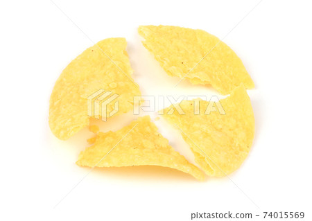 Broken potato chips isolated on white background. Broken potato chips isolated on white background. 74015569
