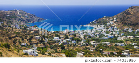 Panoramic view of Kini village and beach in Syros island. Greece Panoramic view of Kini village and beach in Syros island. Greece 74015980