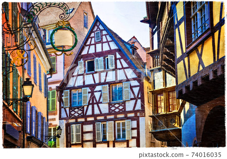 Colorful traditional houses of Alsace region - Strasburg town. France. artistic picture Colorful traditional houses of Alsace region - Strasburg town. France. artistic picture 74016035