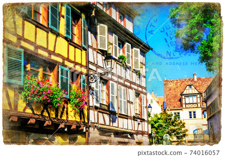 Colorful floral town Colmar in Alsace, France. Retro styled picture 74016057