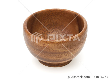 Empty wooden bowl on white background. Empty wooden bowl on white background. 74016247