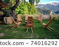 Garden lounge with mountain view 74016292
