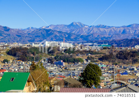 The town of river terraces and Mt. Sukai The town of river terraces and Mt. Sukai 74018531