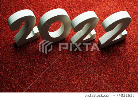 2022 Happy New Year with space copy on red glitter background 74021635