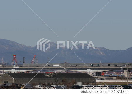 Mountains north of the Suzuka Mountains seen from the Owari Plain, Mt. Ryozen, Mt. Karasuhata 74023891