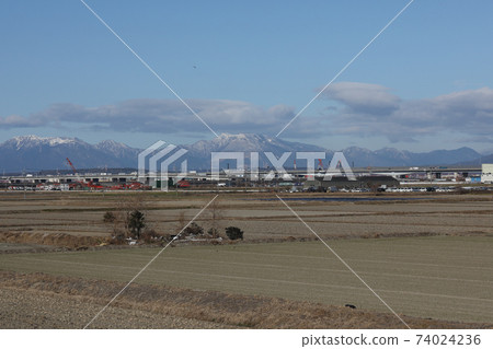 Suzuka Mountains, Ryugadake, Fujiwaratake, Ryozenyama, Karasuhatake seen from the Owari Plain 74024236