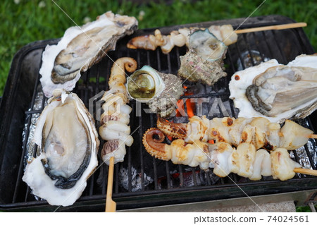 Charcoal grilled BBQ Amiyaki oyster seafood squid octopus Charcoal grilled BBQ Amiyaki oyster seafood squid octopus 74024561