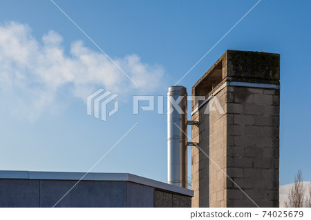 Chimney fireplace with smoke Chimney fireplace with smoke 74025679
