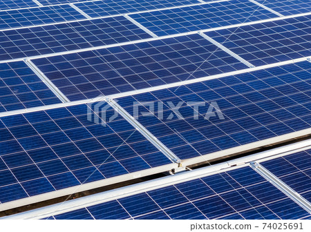the solar panels on the roof the solar panels on the roof 74025691