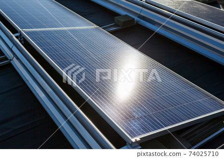 the solar panels on the roof the solar panels on the roof 74025710
