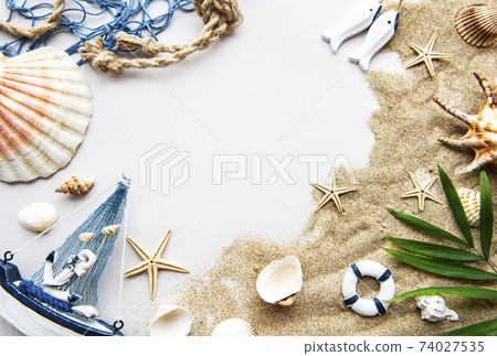 Seashells on sand. Travel concept Seashells on sand. Travel concept 74027535