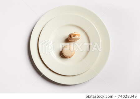 Minimalist composition with two macaroons 74028349