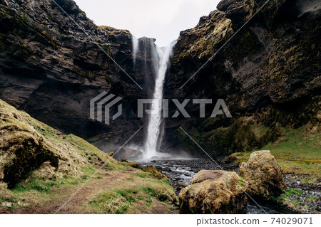 Kvernufoss waterfall in southern Iceland, on a golden ring. Kvernufoss waterfall in southern Iceland, on a golden ring. 74029071