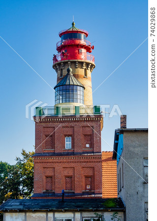 Beautiful view of famous Kap Arkona lighthouse in summer, island of Ruegen, Baltic Sea, Germany Beautiful view of famous Kap Arkona lighthouse in summer, island of Ruegen, Baltic Sea, Germany 74029868
