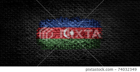 Small national flags of the Azerbaijan on a light blurry background Small national flags of the Azerbaijan on a light blurry background 74032349