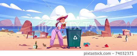 Woman collects trash to garbage bin on sea beach 74032371